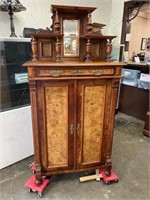 BURLED FRONT VICTORIAN CUPBOARD