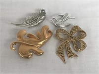 Lot of 4 Goldtone/Silvertone Brooches