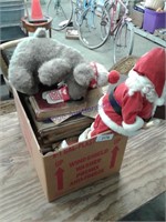 Santa, old books, stuffed bear
