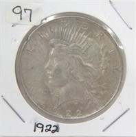 1922 Peace dollar; 1948 Franklin 1/2 dollar in