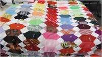 POLYESTER PATCHWORK TIED QUILT, 92 X 50 IN.