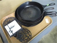 FRYING PANS AND TRIVETS