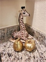 Giraffe and golden fruit