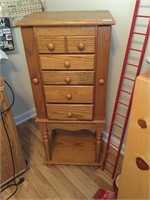 Jewelry stand with lined drawers and mirror