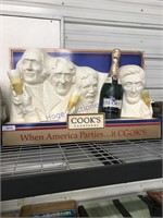 Cooks Champagne store display sign