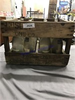 Cosley wood crate with glass bottles