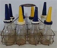 8 glass oil bottles w/ wire holder