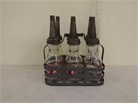 6- 1 quart Mohawk oil bottles w/ holder