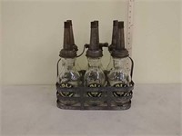 6- 1 quart Polly oil bottles w/ holder