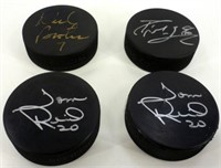 2 Autographed Tom Reid Hockey Pucks, MN North