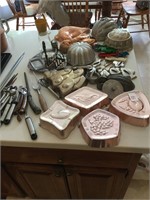 Tin molds, cookie cutters, toast, more