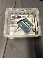 Hand mixer in crate