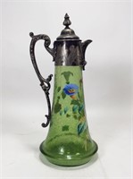 Green glass pitcher, butterfly and flower design,