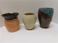 Pottery 3 vases, largest is 8" T x 5" W,one is