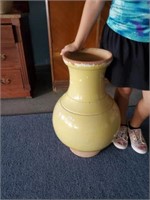 Large yellow pottery urn
