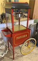 5 foot popcorn maker on a wheelie cart, plug-in