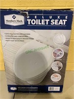 Deluxe toilet seat like new in the box, by