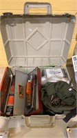 Storage container with two gun cleaning kits,