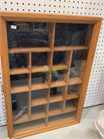 18 compartment glass top display case, with a