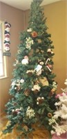 TALL CHRISTMAS TREE WITH DECORATIONS