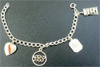 Sterling Silver Charm Bracelet with Four Sterling