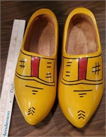 Old mustard yellow dutch holland wooden shoes