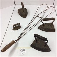 Rug Beater, cast iron ices and toy iron