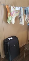 (9) GARDEN FLAGS AND LARGE SUITCASE