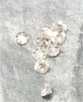 9 Loose Diamonds approx. .01ct each