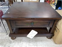 Ashley furniture lift top table with a shelf