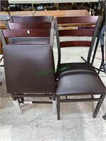 Set of four folding chairs with wood frames and