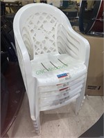 Six plastic American rose patio chairs that stack