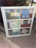 Window frame with six panes with quilted pieces