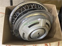 Box of four vintage hubcaps including one for