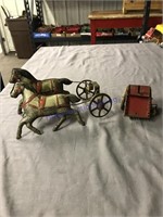 tin horsewith windup cart