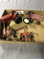 pair of small international toy tractors