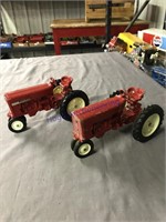 pair of international toy tractors
