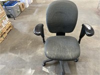 Blue office chair on rollers