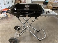STOK Gridiron portable gas grill, handle is
