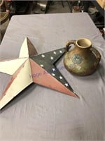 Tin flag star, pottery jug