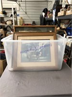 Tub of framed pictures