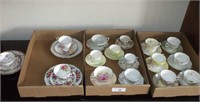 TEA CUPS AND SAUCERS