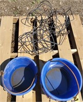 Pallet of feed buckets and holders