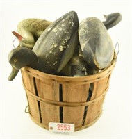Bushell basket of vintage decoys to include: