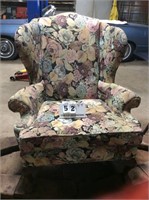 Stuffed floral armchair with claw on ball legs
