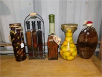 5 Vinegar Bottles With Fruit And Vegetables