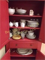 Contents of red kitchen cabinet