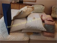 9 pillows, assorted sizes