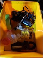 Yellow tub of misc items