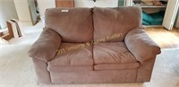 Brown cloth love seat